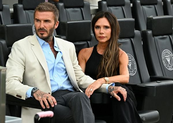 Inter Miami's co-owner David Beckham sits with his wife, English fashion designer Victoria Beckham, prior to the Leagues Cup football match between Inter Miami CF and Atlanta United FC at DRV PNK Stadium in Fort Lauderdale, Florida, on July 25, 2023.