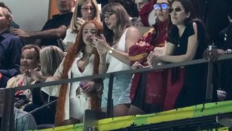 Ice Spice, from left, Taylor Swift, Este Haim and Alana Haim watch during the first half of the NFL Super Bowl 59 football game between the Kansas City Chiefs and the Philadelphia Eagles, Sunday, Feb. 9, 2025, in New Orleans. (AP Photo/Gerald Herbert)