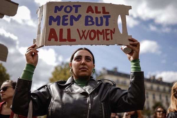 A protester holds a placard as she takes part in a demonstration in support of Gisele Pelicot in Paris on September 14, 2024. With her bobbed red hair and dark glasses, Gisele Pelicot has become the embodiment of victims of sexual violence, the figurehead of the fight against chemical submission since her determined and dignified appearances at the trial of the men accused of raping her. Drugged with anti-anxiety drugs by her husband, then raped in her sleep over a period of ten years by him and dozens of men invited by him, the septuagenarian is the main victim in an extraordinary trial that opened on September 2, 2024, before the Vaucluse criminal court in Avignon.