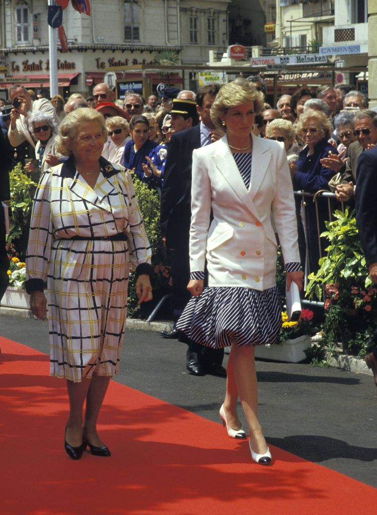 Cannes Film Festival HRH, THE PRINCESS DIANA OF WALES.Cannes Film Festival, France, 15th May 1987..Lady Di family her royal highness full length white jacket blue and white striped dress puff ball skirt two tone bi colour shoes pumps Chanel style.Ref: CAP/PL. Phil Loftus/ Cannes France Copyright: xPhilxLoftus/CapitalxPicturesx
