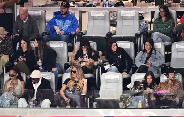 US actress La La Anthony (L), US media personality Khloe Kardashian (C), Canadian model Winnie Harlow (middle row, C), Canadian singer-songwriter Justin Bieber (R) and his wife US model Hailey Bieber attend Super Bowl LVIII between the Kansas City Chiefs and the San Francisco 49ers at Allegiant Stadium in Las Vegas, Nevada, February 11, 2024. Patrick T. Fallon / AFP