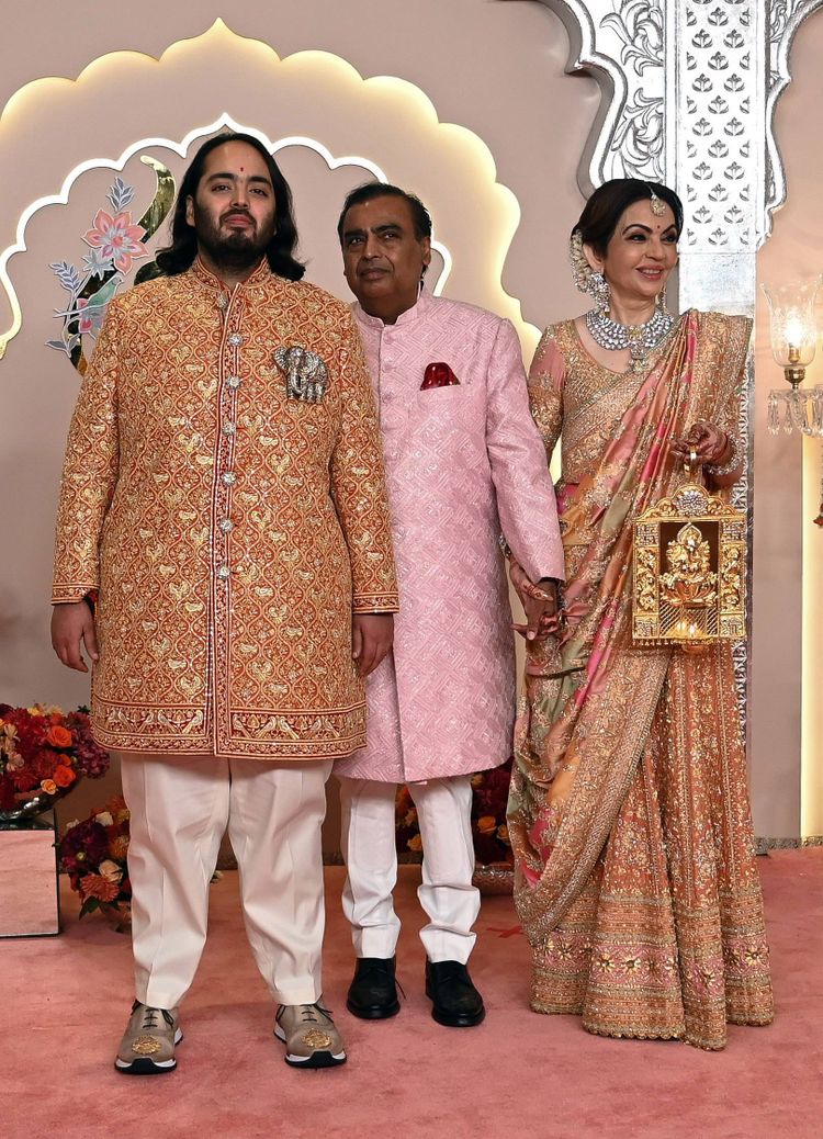 MUMBAI, INDIA - JULY 12: Neeta Ambani, Mukesh Ambani and Anant Ambani the Wedding ceremony of Anant Ambani and Radhika Merchant at the Jio World Convention Centre, BKC on July 12, 2024 in Mumbai, India. Photo by Raju Shinde/Hindustan Times Wedding Ceremony Of Anant Ambani And Radhika Merchant PUBLICATIONxNOTxINxIND